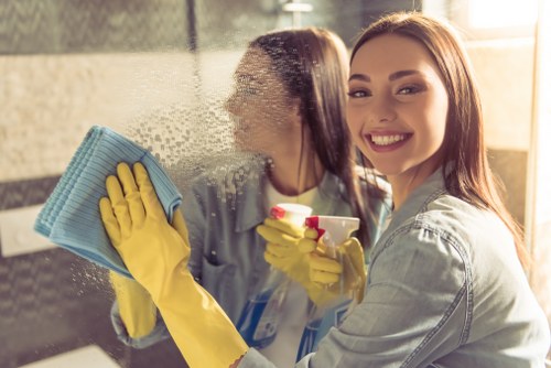 Local builders cleaning team working in Kensington after renovation